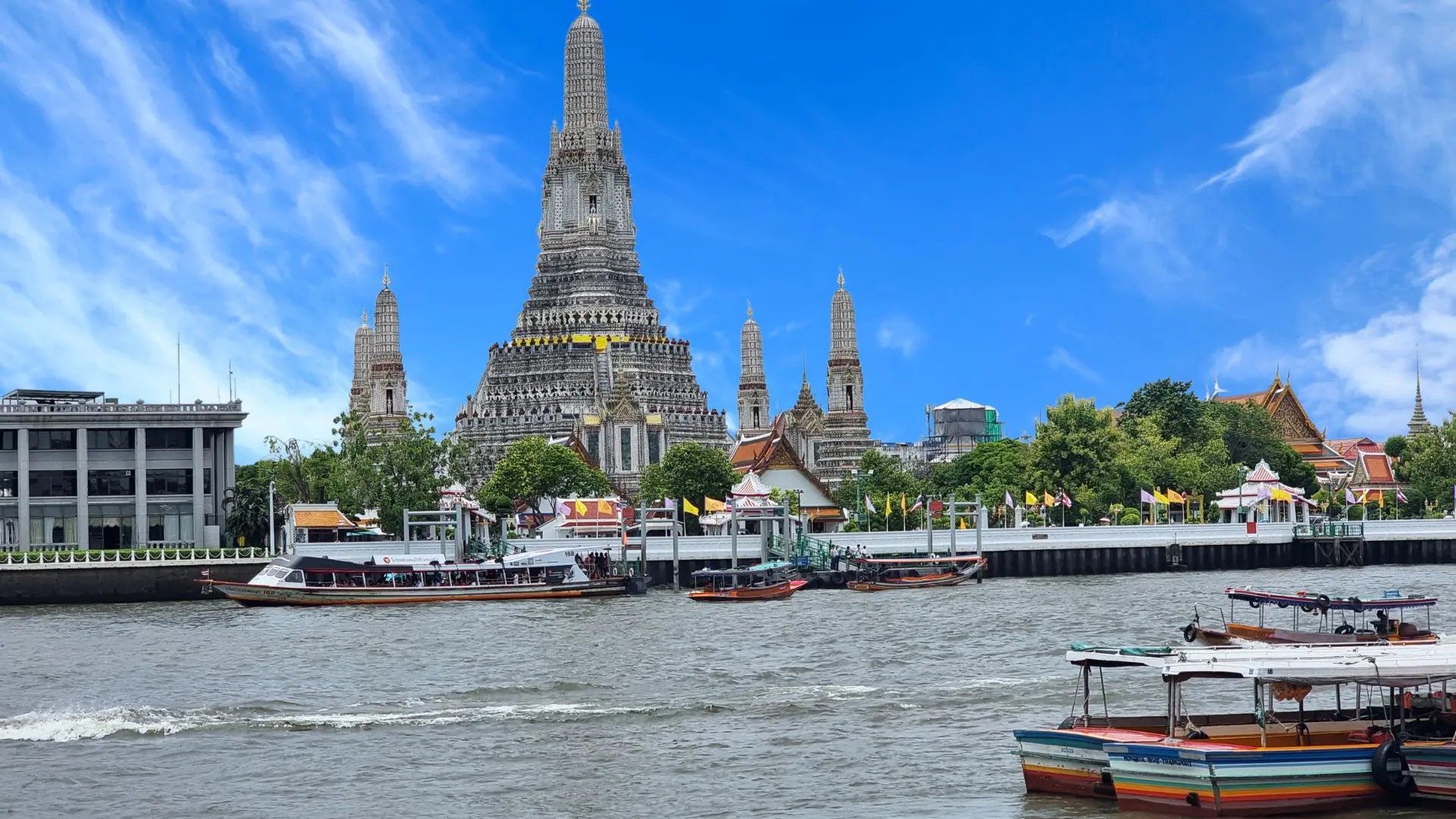 Wat Arun temple on the banks of the Chao Phraya River in Bangkok