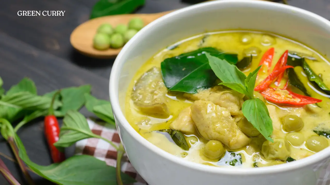 Making green curry in the Thai cooking class in Phuket