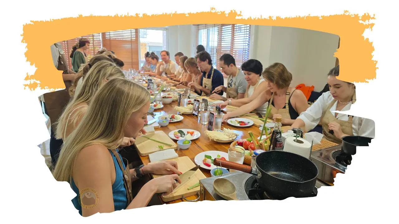 Students in aprons chopping vegetables at a long table with burners and pans, inside an orange brushstroke frame