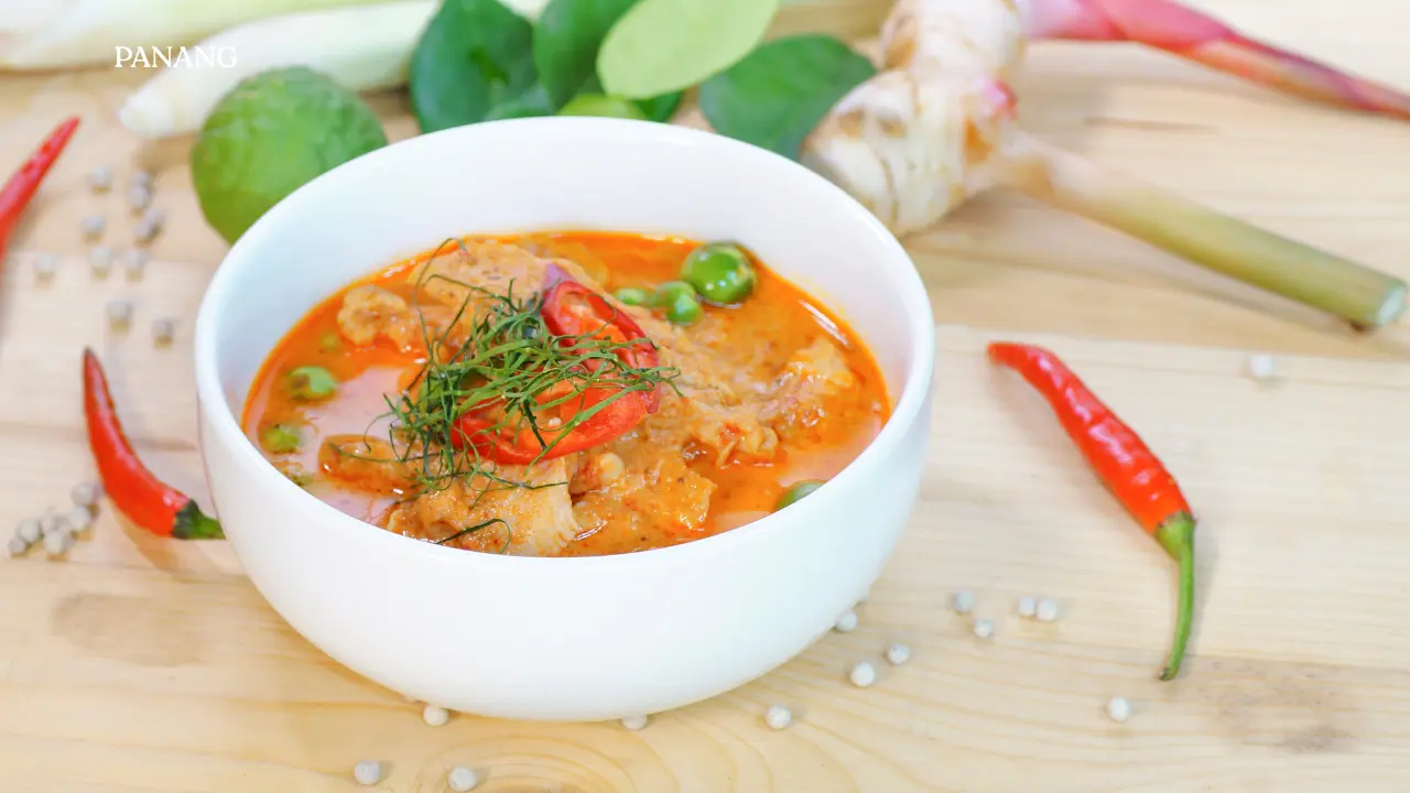 Making panang curry in the Thai cooking class in Phuket