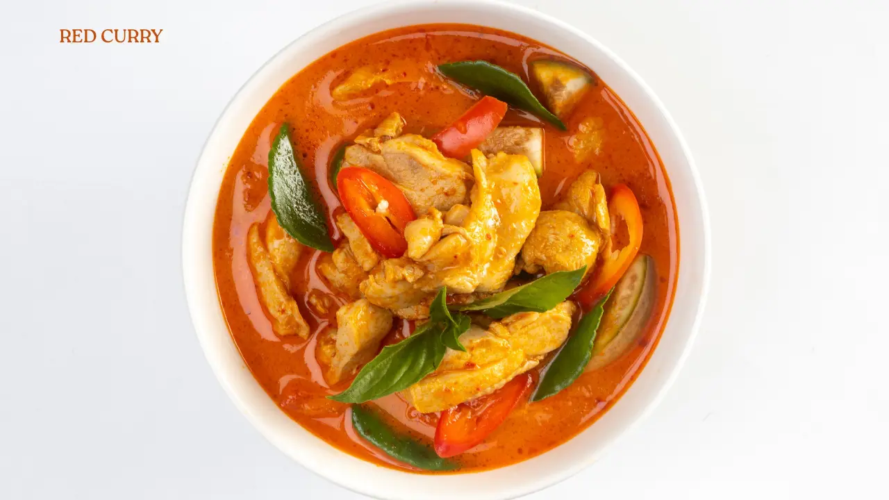 Making red curry in the Thai cooking class in Phuket